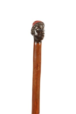 Lot 851 - A 19TH CENTURY FOLK ART WALKING CANE