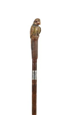 Lot 849 - AN EARLY 20TH CENTURY CARVED AND PAINTED PARROT HANDLED WALKING CANE