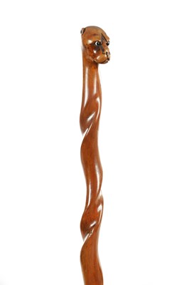 Lot 869 - A 19TH CENTURY FOLK ART WALKING CANE