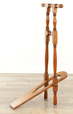 Lot 1586 - A 19TH CENTURY OAK BOOT JACK