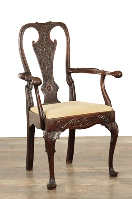 Lot 1526 - A GEORGE II CARVED MAHOGANY ARMCHAIR
