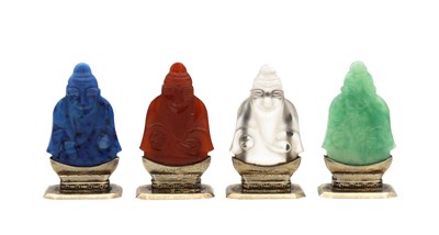 Lot 212 - A CASED SET OF FOUR SILVER AND CARVED STONE / GLASS MENU HOLDERS