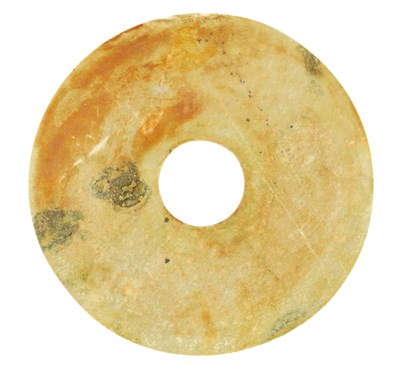 Lot 505 - A CHINESE RUSSET JADE BI DISC
