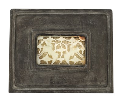 Lot 566 - A CHINESE QING DYNASTY CARVED JADE PANEL