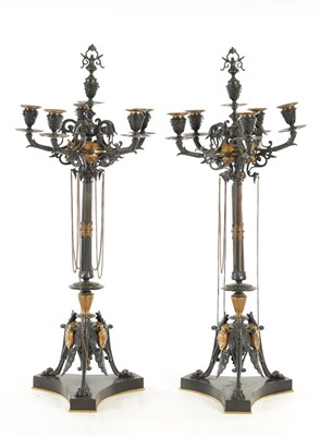Lot 1143 - A PAIR OF 19TH CENTURY BRONZE AND GILT BRONZE REGENCY STYLE FIVE BRANCH CANDELARBRA