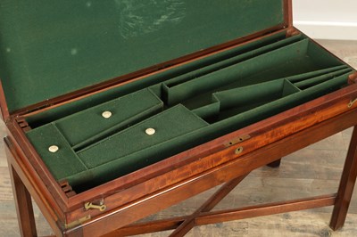 Lot 1583 - A 19TH CENTURY BRASS BOUND FIGURED MAHOGANY GUN CASE