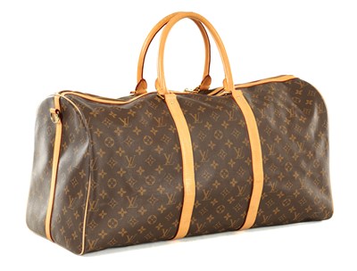 Lot 886 - A GENUINE LOUIS VUITTON TRAVEL BAG