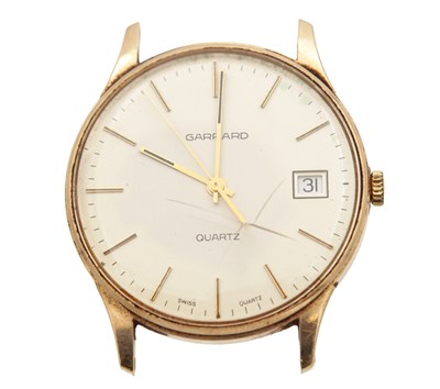 Lot 1194 - A GENTLEMAN'S 9CT GOLD GARRARD QUARTZ WRIST WATCH