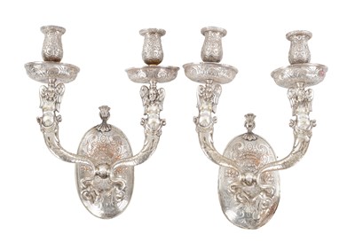Lot 919 - A PAIR OF 20TH CENTURY SILVER PLATED TWO-LIGHT WALL SCONCES