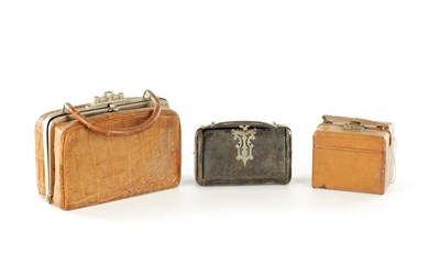 Lot 1747 - A VINTAGE CROCODILE LADIES TRAVELING VANITY BAG WITH TWO LEATHER CASES