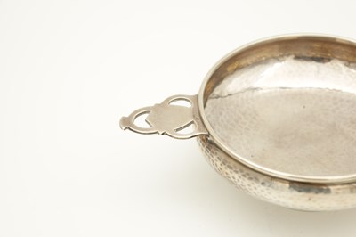 Lot 87 - AN ARTS AND CRAFTS SILVER TWO-HANDLED BOWL