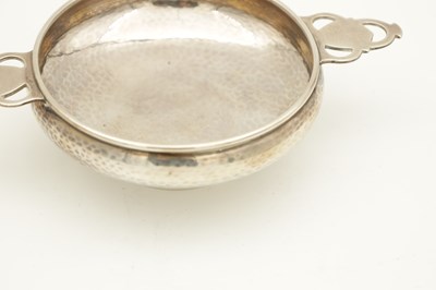 Lot 87 - AN ARTS AND CRAFTS SILVER TWO-HANDLED BOWL
