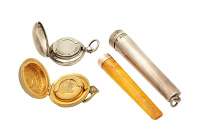 Lot 216 - A GOLD MOUNTED SILVER CASED CHEROOT HOLDER AND TWO SOVEREIGN CASES