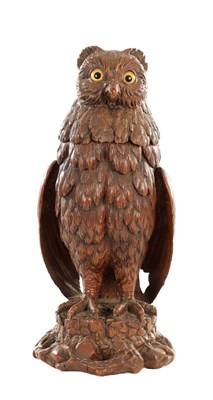 Lot 785 - A 19TH CENTURY CARVED LINDEN WOOD BLACK FOREST TOBACCO JAR FORMED AS AN OWL
