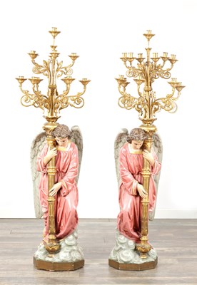 Lot 1057 - A PAIR OF LATE 19TH CENTURY TERRACOTTA ANGEL CANDELABRA
