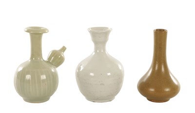 Lot 444 - A GROUP OF THREE CHINESE MONOCHROME-GLAZED PORCELAIN VESSELS