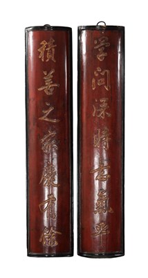 Lot 484 - A PAIR OF CHINESE RED LACQUERED CARVED CALLIGRAPHY COUPLETS