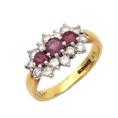 Lot 313 - AN 18CT YELLOW GOLD RUBY AND DIAMOND CLUSTER RING