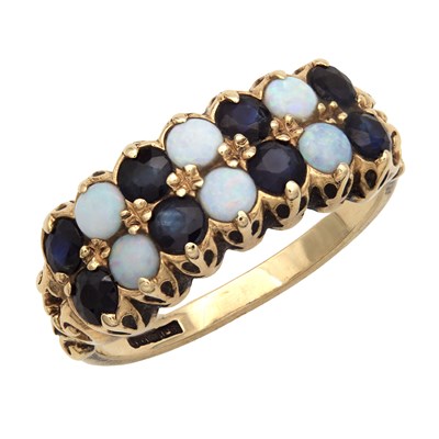 Lot 258 - A 9CT YELLOW GOLD OPAL AND SAPPHIRE RING