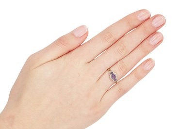 Lot 297 - A 9CT YELLOW GOLD AMETHYST AND DIAMOND RING