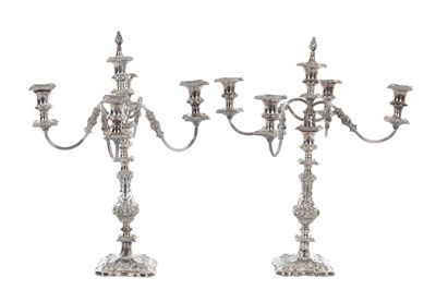 Lot 144 - A LARGE PAIR OF 19TH CENTURY SILVER PLATED FOUR BRANCH CANDELABRA
