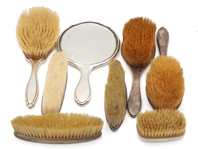 Lot 103 - TWO EARLY 20TH CENTURY ENGLISH SILVER VANITY SETS