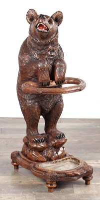 Lot 762 - A LATE 19TH CENTURY BLACK FOREST CARVED WOOD BEAR STICK STAND
