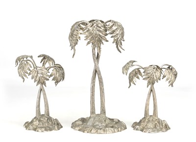 Lot 214 - THREE LATE VICTORIAN SILVER PLATED PALM TREE TABLE ORNAMENTS ON NATURALISTIC BASES