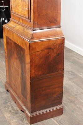 Lot 1235 - JOHN LEGG, IN HOLBURN, LONDON. AN EARLY 18TH CENTURY FIGURED WALNUT EIGHT-DAY LONGCASE CLOCK
