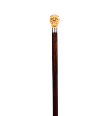 Lot 1450 - A 19TH CENTURY CARVED IVORY MAN HEAD WALKING CANE