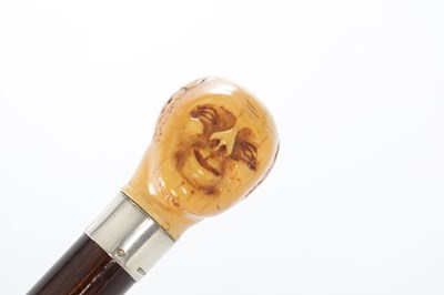 Lot 1450 - A 19TH CENTURY CARVED IVORY MAN HEAD WALKING CANE