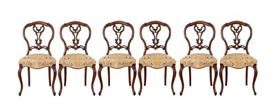 Lot 1431 - A SET OF SIX VICTORIAN WALNUT BALLOON BACK SIDE CHAIRS