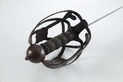 Lot 646 - A 17TH CENTURY BASKET HILTED SWORD