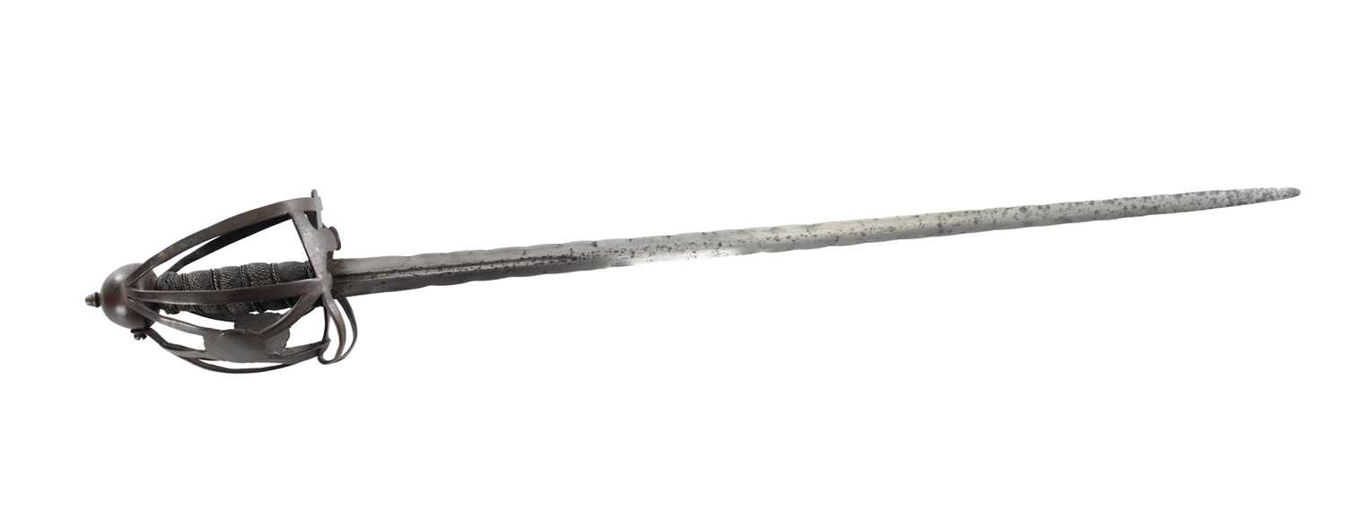 Lot 646 - A 17TH CENTURY BASKET HILTED SWORD