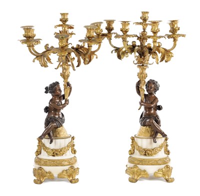 Lot 1008 - A PAIR OF 19TH CENTURY FRENCH BRONZE AND ORMOLU SIX-LIGHT CANDELABRA