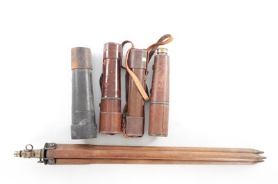 Lot 883 - A COLLECTION OF EARLY 20TH CENTURY LEATHER-BOUND TELESCOPES AND A WOOD TRIPOD STAND