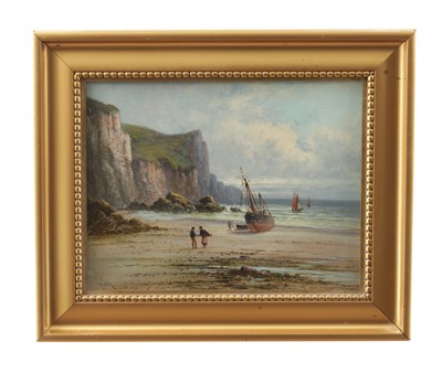 Lot 669 - FRANK HIDER (1866-1933) AN OIL ON CANVAS COASTAL SCENE WITH BEACHED FISHING BOATS