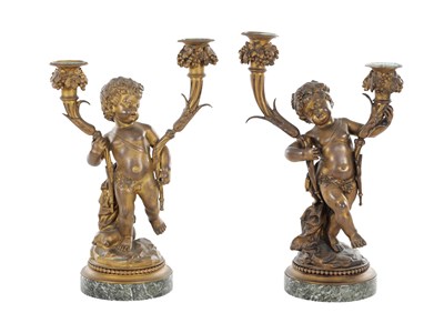 Lot 1014 - A PAIR OF 19TH CENTURY FRENCH GILT BRONZE FIGURAL TWO-LIGHT CANDELABRA