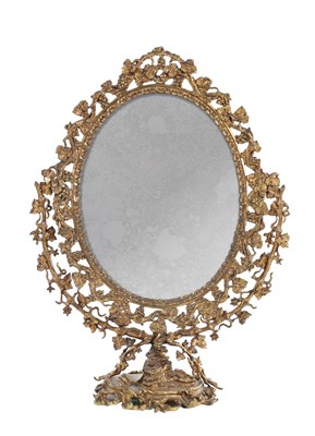 Lot 1018 - A 19TH CENTURY FRENCH ORMOLU GRAPE VINE OVAL DRESSING TABLE MIRROR
