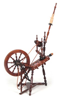 Lot 1012 - A 19TH CENTURY FRUITWOOD SPINNING WHEEL