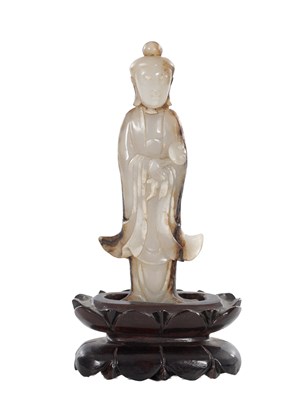 Lot 603 - A CHINESE JADE FIGURE OF A DEITY