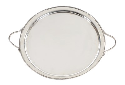 Lot 141 - AN EARLY 20TH CENTURY ENGLISH SILVER TWIN-HANDLED TRAY