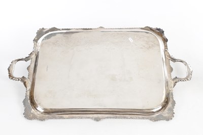 Lot 182 - A LARGE EDWARDIAN ENGLISH SILVER TWIN-HANDLED TRAY