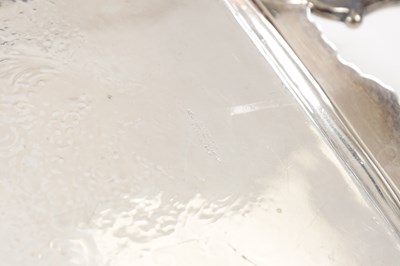 Lot 182 - A LARGE EDWARDIAN ENGLISH SILVER TWIN-HANDLED TRAY
