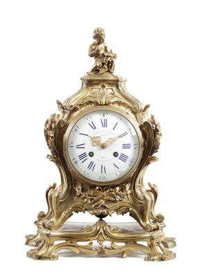 Lot 1291 - A 19TH CENTURY FRENCH GILT BRASS ROCOCO STYLE MANTEL CLOCK