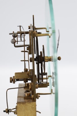 Lot 136 - THE REASON MANUFACTURING COMPANY LTD. AN EARLY 20TH CENTURY MURDAY TYPE ELECTRIC CLOCK WITH GLASS DIAL UNDER GLASS DOME ON TURNED MAHOGANY BASE