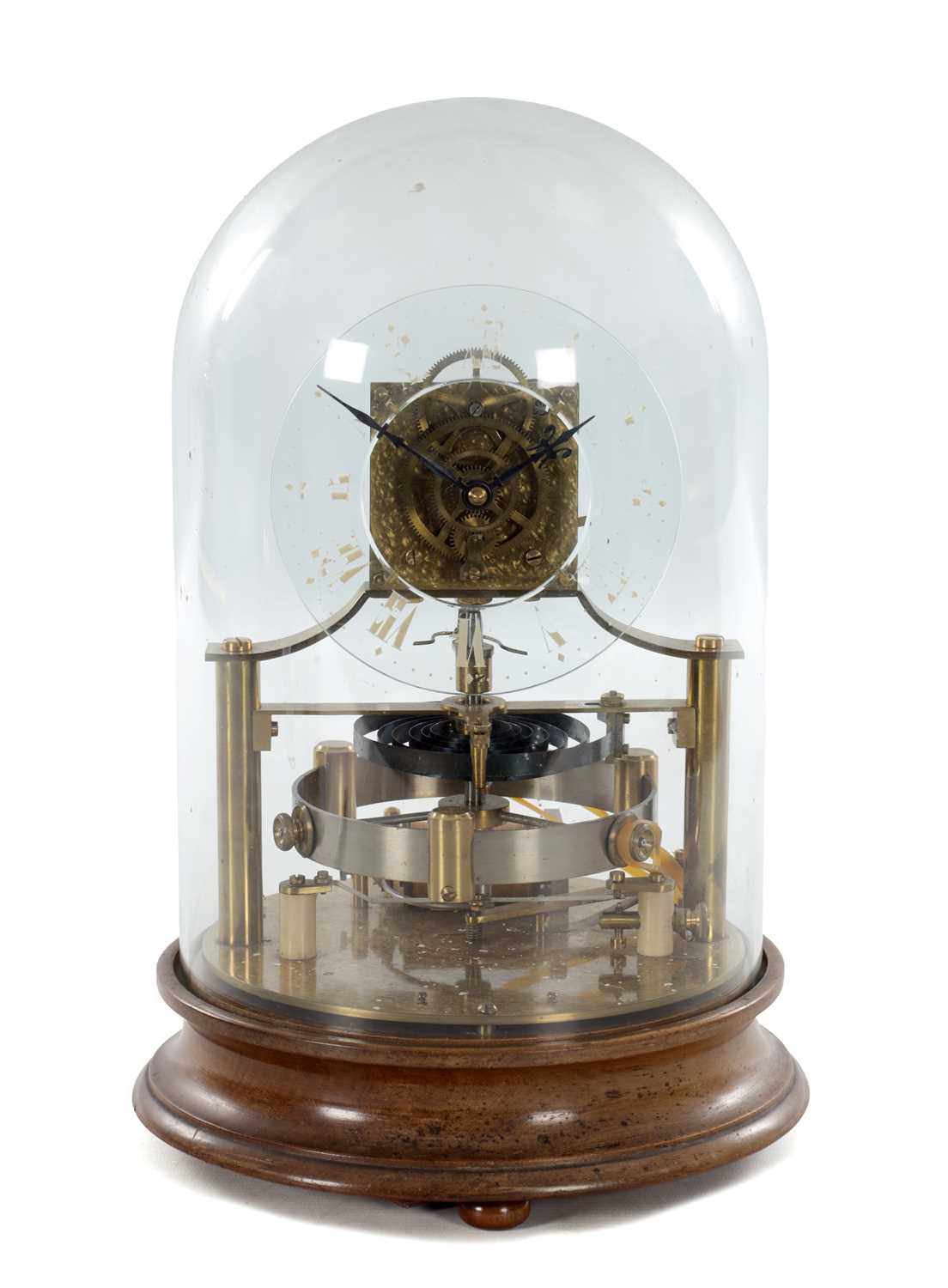 Lot 136 - THE REASON MANUFACTURING COMPANY LTD. AN EARLY 20TH CENTURY MURDAY TYPE ELECTRIC CLOCK WITH GLASS DIAL UNDER GLASS DOME ON TURNED MAHOGANY BASE