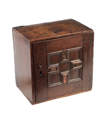 Lot 1487 - A 17TH CENTURY OAK SPICE CUPBOARD