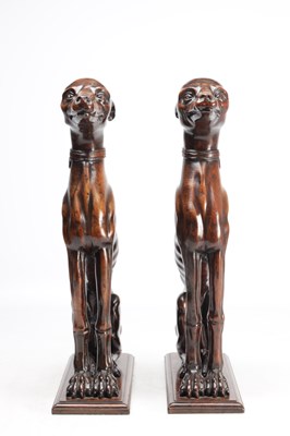 Lot 992 - A FINE PAIR OF 18TH CENTURY CARVED WALNUT HERALDIC GREYHOUND FIGURES