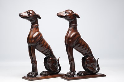Lot 992 - A FINE PAIR OF 18TH CENTURY CARVED WALNUT HERALDIC GREYHOUND FIGURES